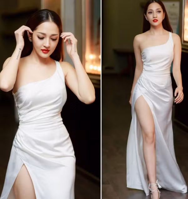 Đặc biệt, váy xẻ tà để lộ vùng da trắng mịn sau lớp vải rất kích thích trí tưởng tượng. Làn da tươi mát, mịn màng mang tới sự gợi cảm khó cưỡng mà không cần hở bạo.