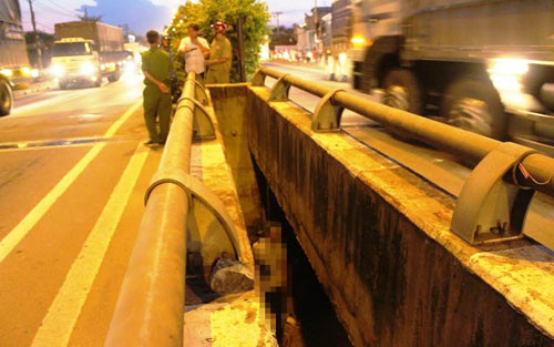 Hoang hon phat hien thanh nien treo co giua khe cau