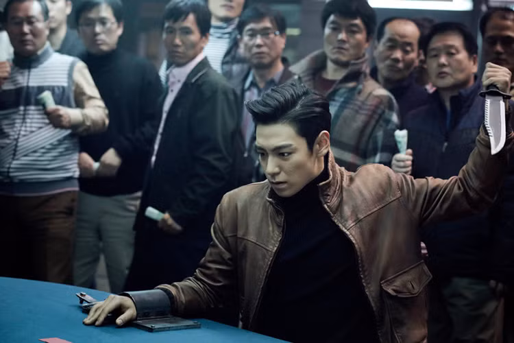 Trong “Tazza: The High Roller 2”, nam ca sĩ sinh năm 1987 đóng vai chàng trai trẻ bị kéo vào thế giới cờ bạc và có mối tình đầy trắc trở. Ảnh: Dramastyle