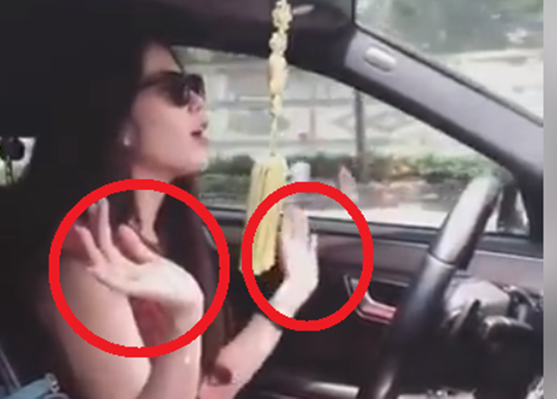 Bị chỉ trích vì bỏ 2 tay khi lái xe, Nam Em cho biết, xe của cô có chế độ lái tự động và người đẹp đã chọn con đường vắng mới dám buông tay. Ảnh: Dân Việt.