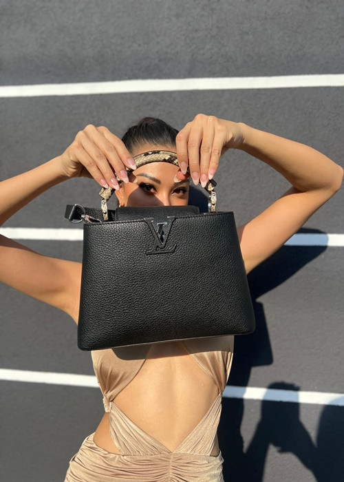 Kim Duyên kết hợp trang phục với phụ kiện hàng hiệu. Ảnh: Miss Supranational - Vietnam