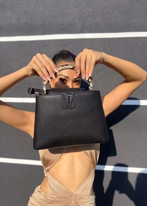 Kim Duyên kết hợp trang phục với phụ kiện hàng hiệu. Ảnh: Miss Supranational - Vietnam