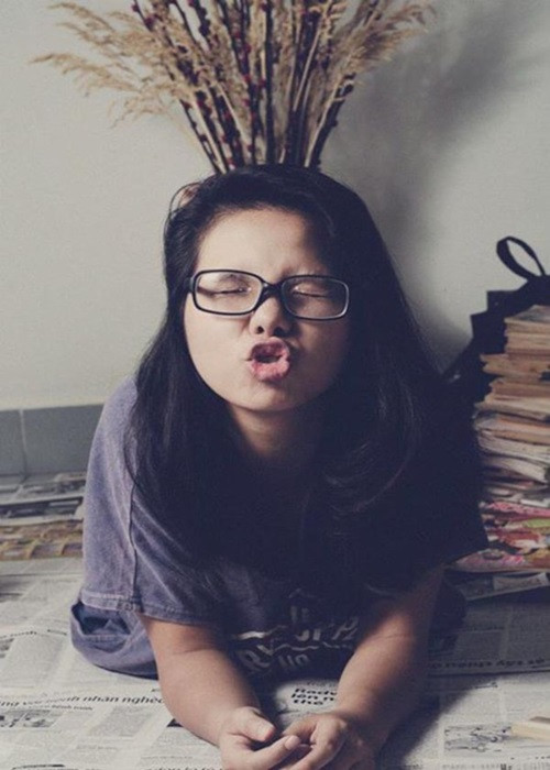 Hình ảnh Vũ Cát Tường nhí nhảnh, để tóc dài nữ tính. Ảnh: Saostar