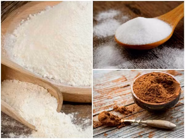 Để chuẩn bị làm dầu gội khô handmade này, bạn cần chuẩn bị các nguyên liệu tinh bột ngô, backing soda và bột ca cao - những thành phần dễ kiếm, an toàn cho sức khỏe.