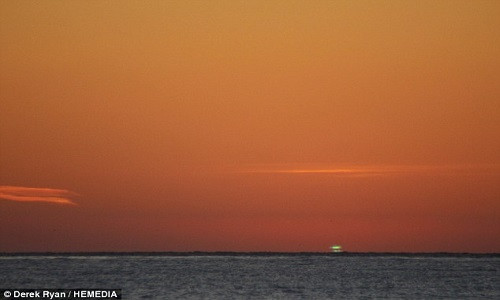 Tận mục khoảnh khắc hiếm Mặt trời chuyển màu xanh tại Scotland Tan muc khoanh khac hiem Mat troi chuyen mau xanh tai Scotland