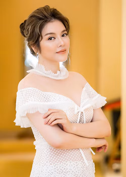 Lý Nhã Kỳ xuất hiện tươi tắn tại sự kiện dập tan tin đồn. Ảnh: Vietnamnet