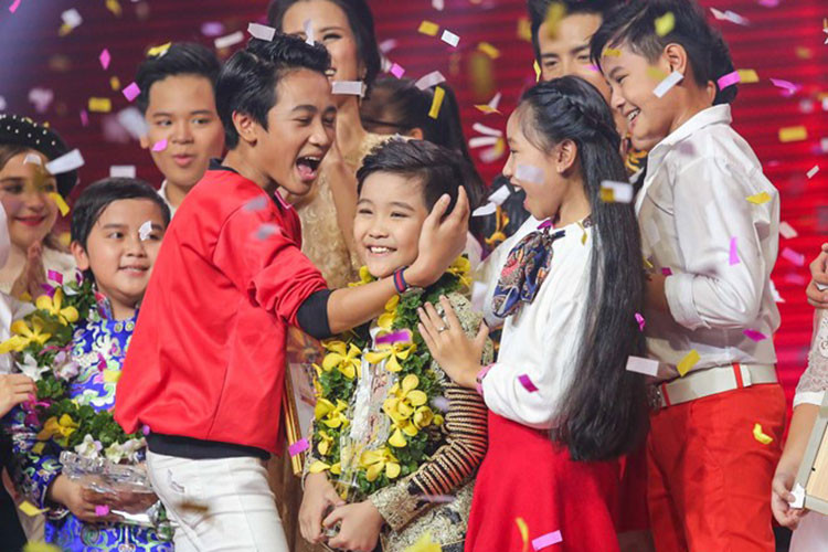 Trịnh Nhật Minh là giọng ca nhí tài năng, giành ngôi vị quán quân Giọng hát Việt nhí mùa 4. Ảnh: hanoimoi