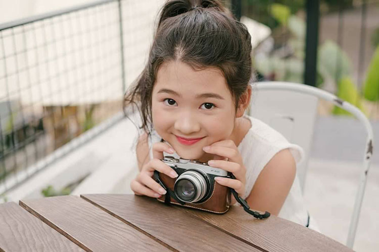 Sau Giọng hát Việt nhí 2017, Ngọc Ánh khá im hơi lặng tiếng. Hiện, học trò của Vũ Cát Tường vẫn theo đuổi âm nhạc. Ảnh: FBNV