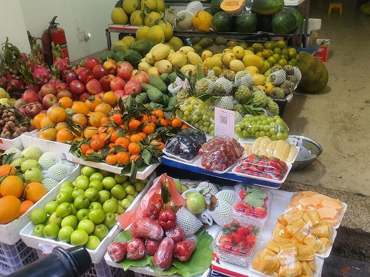 Đi chợ mua mớ rau, con cá, uống cốc trà đá cũng quét mã QR - Hình 3 Di cho mua mo rau, con ca, uong coc tra da cung quet ma QR-Hinh-3