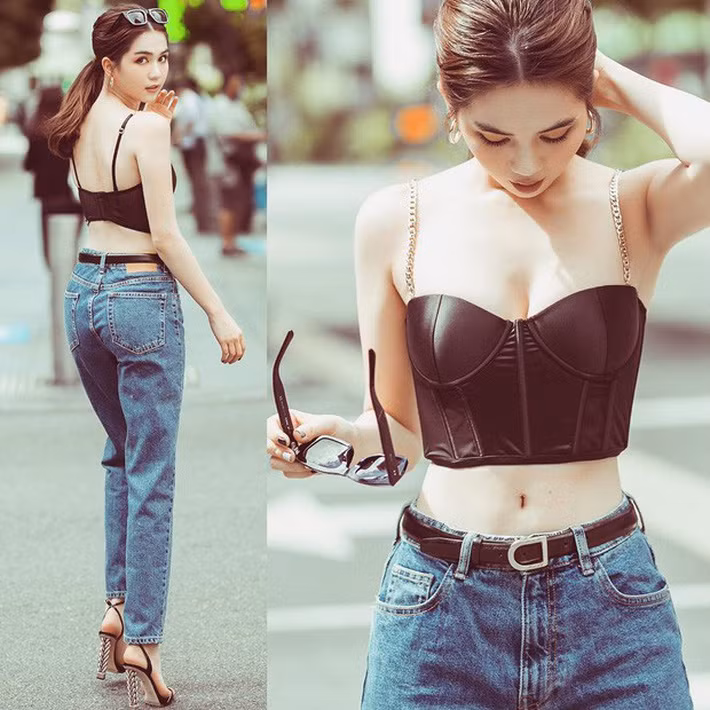 Chiếc áo hai dây đã giúp Ngọc Trinh khoe hết thảy những lợi thế ngoại hình, từ làn da trắng đến khuôn ngực phồn thực, nở nang. Ảnh: afamilycdn.