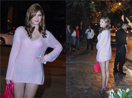 Mẫu Tây Andrea Aybar chỉ mặc chiếc áo len cổ tim để khoe triệt để đôi chân không mấy thon thả của mình. Ảnh: doisongphapluat.