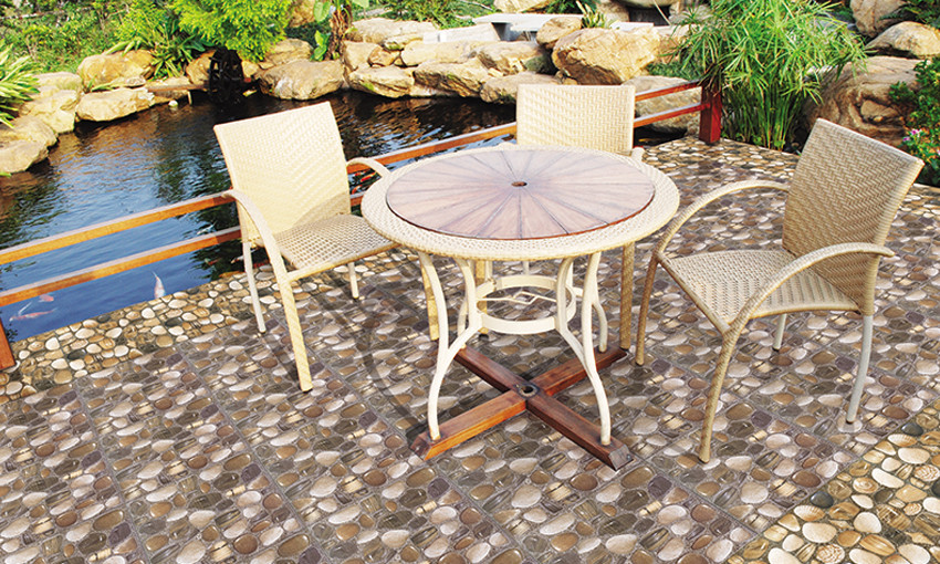 Những năm gần đây, mẫu gạch sỏi mang đến cho không gian sân vườn nhà bạn thêm gần gũi, đậm nét thiên nhiên. Ảnh: Gachdongtam.