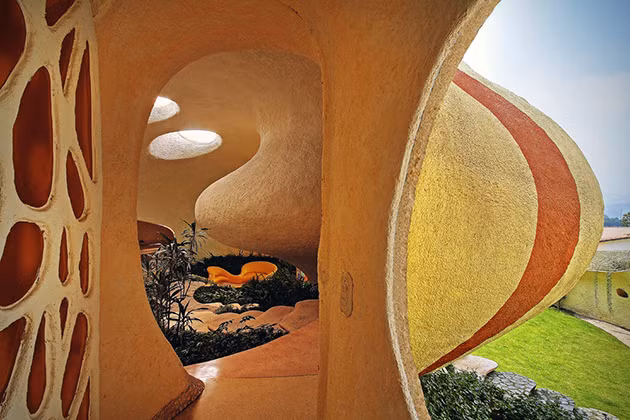 Bạn sẽ cảm giác như đang sống thực sự trong một chiếc vỏ ốc khổng lồ khi ở trong ngôi nhà này. Ảnh hiconsumption.