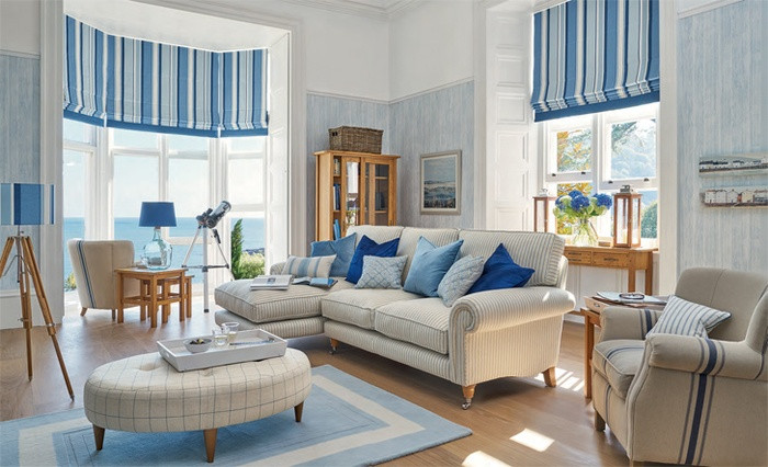 Phòng khách này luôn ngập tràn ánh sáng rọi vào từ các ô cửa kính. Ảnh: Kenhphunu.