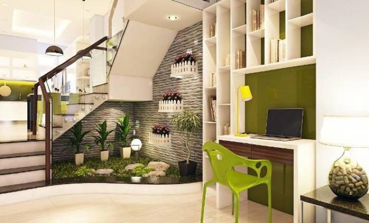 Những loại cây ưa bóng râm được khuyến khích trồng trong tiểu cảnh gầm cầu thang là cây vạn niên, hồng môn, kim ngân...Ảnh: Hddesign.