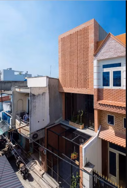 Ngôi nhà được xây bằng gạch mộc có tên Wasp House tại TP HCM. Ảnh: Imgur.