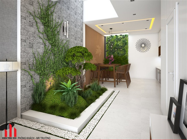 Nhiều gia đình thiết kế giếng trời không có mái che nhưng lại không để ý đến khả năng thoát nước sàn ở đáy giếng. Ảnh: Kientrucmoi.