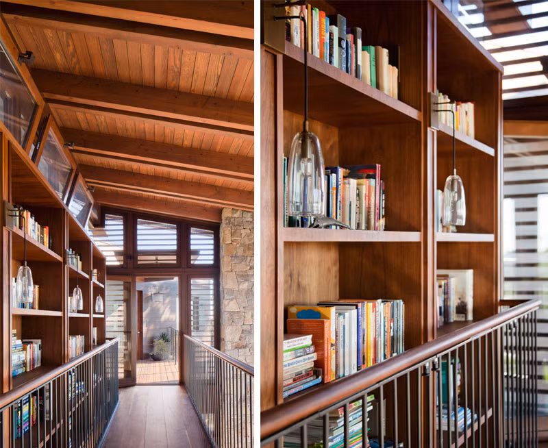 Hành lang dẫn lên phòng ngủ được chủ nhà trang trí bằng chiếc kệ sách.