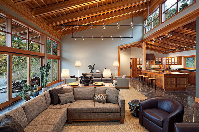 Cửa sổ kính từ sàn đến trần thường được áp dụng phổ biến trong phòng khách. Pacific Northwest Contemporary cũng là ngôi nhà sử dụng kiểu cửa sổ như thế này.