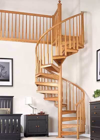 Cầu thang xoắn ốc giúp tiết kiệm diện tích và giúp các luồng khí di chuyển dễ dàng hơn. Ảnh: Cauthang.