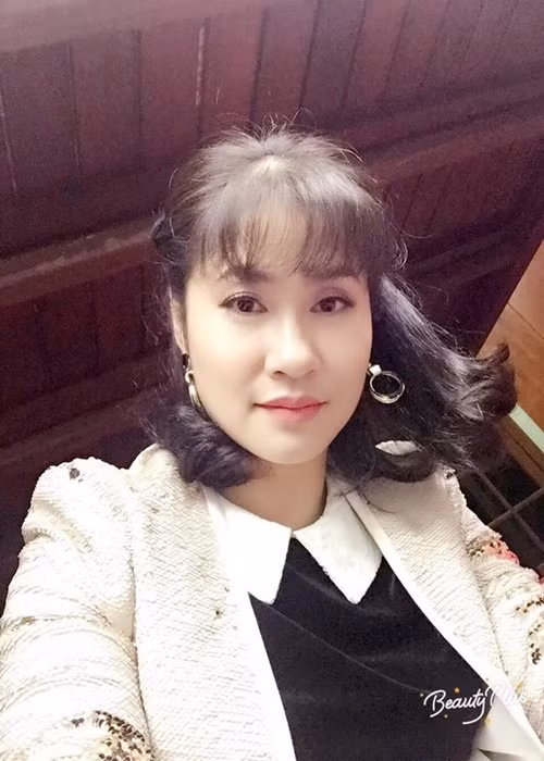 Dù từng 3 lần sinh nở, vợ Quang Thắng vẫn trẻ trung, xinh đẹp. Ảnh: Tiền Phong.