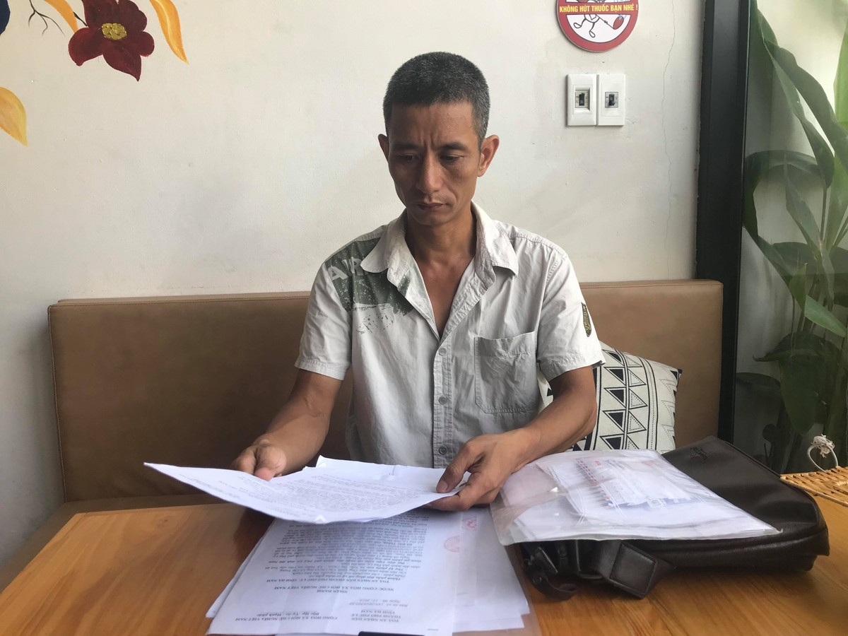 Ngan can hang xom dot rac dan den xo xat, 1 phu nu bi khoi to