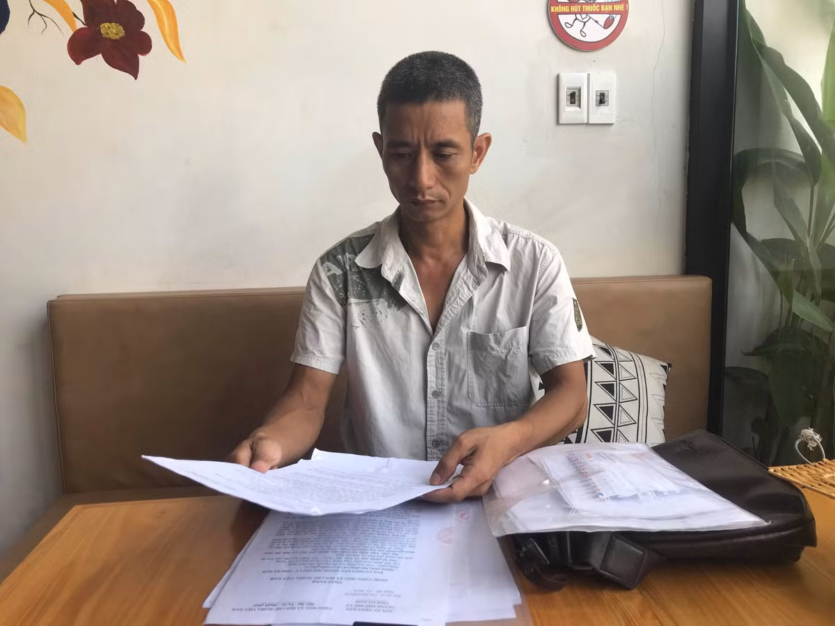 Ngan can hang xom dot rac dan den xo xat, 1 phu nu bi khoi to