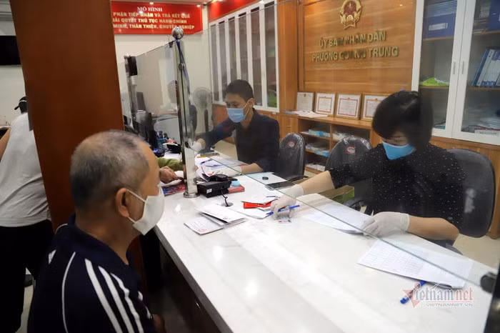 Hang tram nghin nguoi Ha Noi nhan ho tro tu goi 62.000 ty dong-Hinh-9