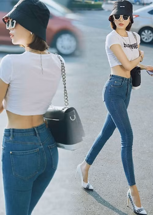 Khi lựa chọn giày bịt mũi, Ngọc Trinh giấu được hạn chế bàn chân với các ngón xòe ra.