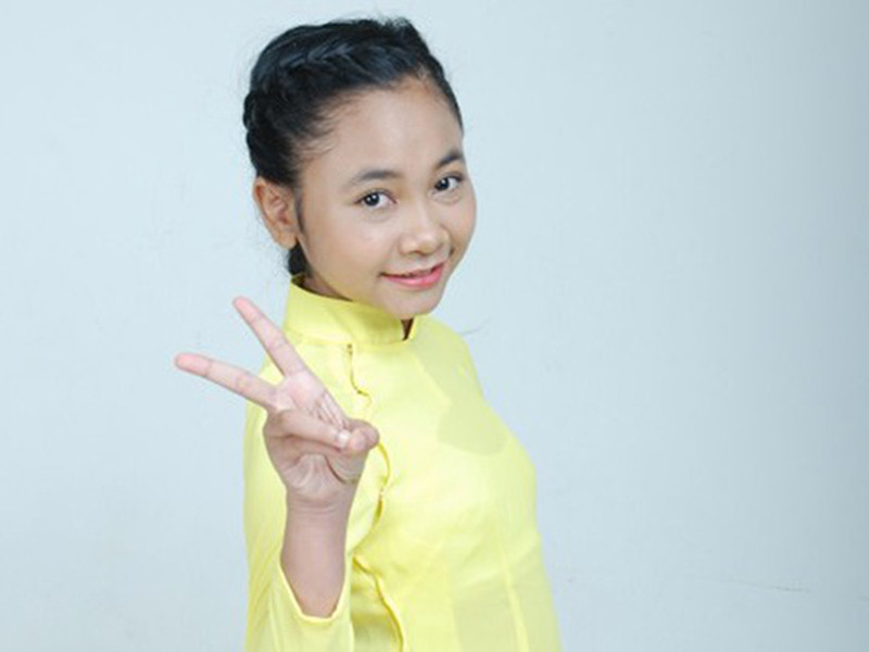 Trần Kayon Thiên Nhâm giành giải á quân Giọng hát Việt nhí 2014. Sau cuộc thi, em sử dụng nghệ danh Thiên Vũ. Ảnh: VTV