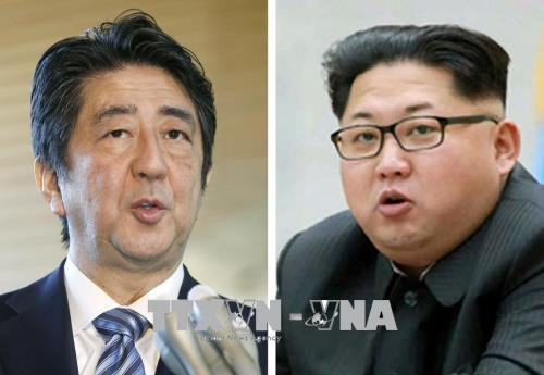 Thủ tướng Nhật Bản Shinzo Abe (trái) và nhà lãnh đạo Triều Tiên Kim Jong-un. Ảnh: Kyodo/TTXVN