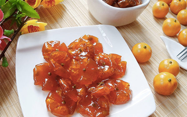 Mứt quất hay mứt tắc được xem là món mứt Tết đặc trưng nhất. Ảnh: agiadinh.