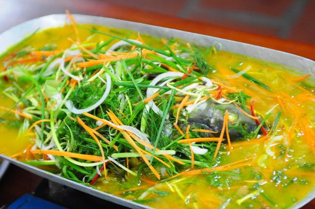 Cá chép om dưa làm đơn giản mà lại thơm ngon, hấp dẫn nhất. Ảnh: lozi.