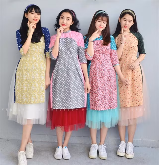 Áo dài cách tân cũng có rất nhiều kiểu tay khác nhau như tay phồng, tay ngắn ôm sát hay tay raplan. Ảnh: diadiemanuong.