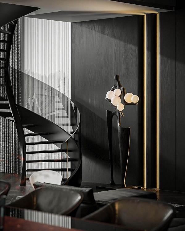 Cầu thang cong được làm hoàn toàn bằng thép tấm, kết hợp bậc đá và khung kính làm không gian thêm sáng tạo và đầy tính nghệ thuật. 