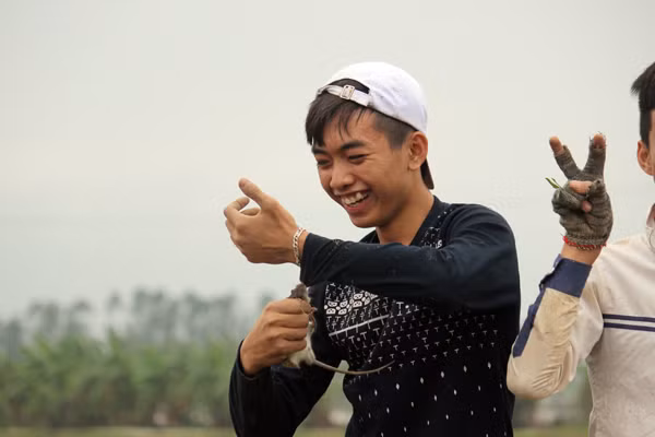 Nụ cười sảng khoái sau khi tóm gọn được con chuột.