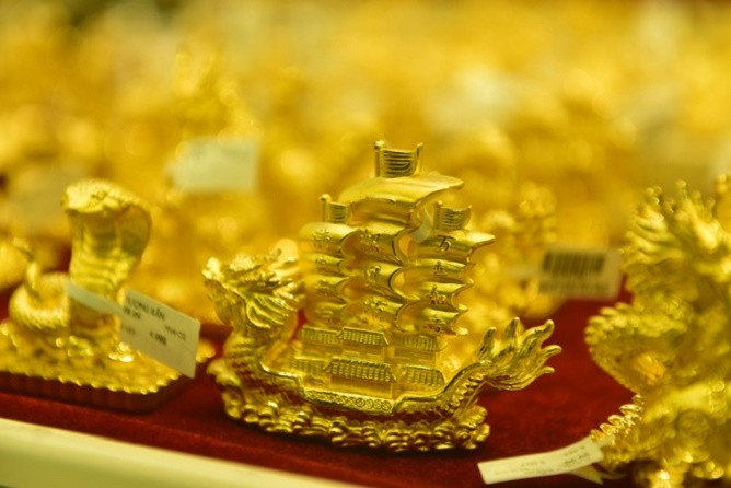 Gia vang hom nay 25/3: Quay quat?