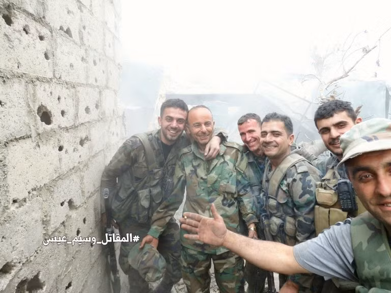 Nụ cười "chiến thắng" của lực lượng chính phủ Damacus. Ảnh: AMN.