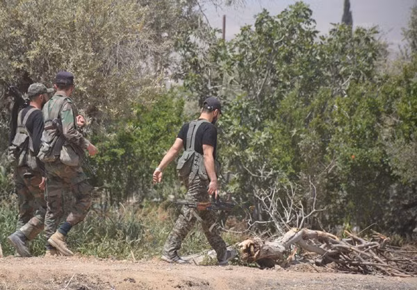 Theo những báo cáo mới nhất, quân đội Syria và nhóm phiến quân đã bắt đầu đàm phán ở al-Qaboun, mở đường cho việc sơ tán các tay súng và thân nhân của họ tới tỉnh Idlib. Ảnh: FNA.
