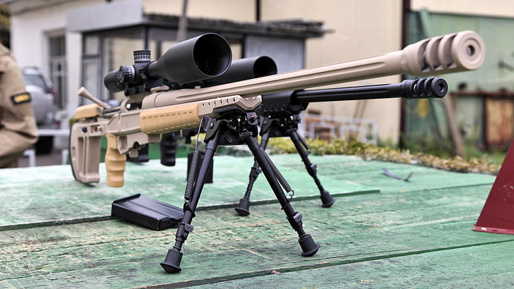 T-5000 được chế tạo bằng thép không gỉ sử dụng thiết kế thoi nạp đạn trượt lên đạn bằng tay cũng như thoi nạp đạn xoay với hai móc khóa viên đạn cố định vào vị trí.