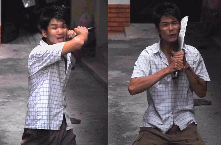 Ngay lập tức, một tên bị đồng đội anh Thanh cùng người dân khống chế bắt giữ, đối tượng còn lại cầm mã tấu (loại dao tự chế) rơi ra từ yên xe máy bỏ chạy bộ vào con hẻm gần đó. (Ảnh Dave MacMillan)