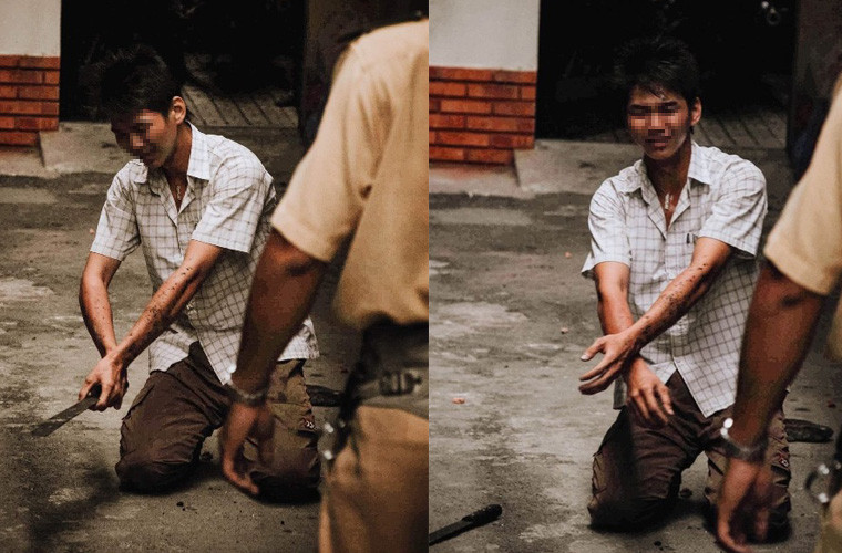 "Trước tình huống nguy hiểm cho chính bản thân đối tượng, tôi đã dùng lời lẽ thiệt hơn thuyết phục; đồng thời hứa sẽ bảo đảm an toàn trong khi phía trước có rất đông người dân đang phẫn nộ vì hành vi của tên cướp”, Đại úy Thanh kể lại. (Ảnh Dave MacMillan)