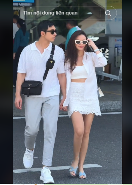 Minh Đạt tháp tùng Midu trong các sự kiện giải trí.