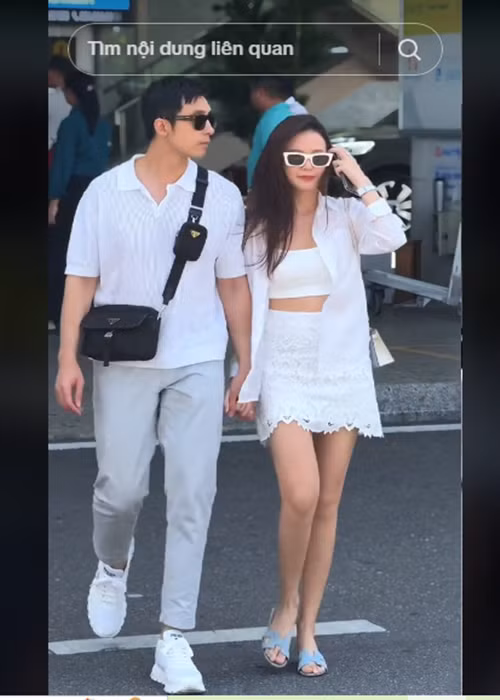 Minh Đạt tháp tùng Midu trong các sự kiện giải trí.