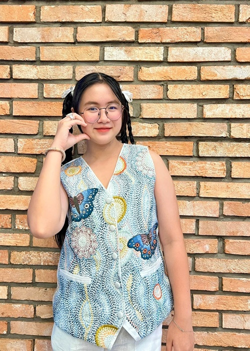 "Bé Bù Tọt" vẫn giữ được sự hồn nhiên dù sớm được chú ý.