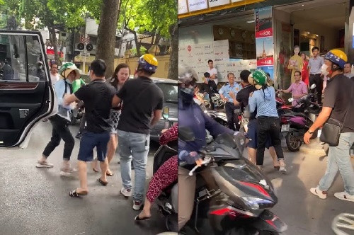 Cô gái bị cho là bồ nhí trong bộ váy đen hở hang bị người vợ đánh nhưng không thể phản kháng, chỉ khóc lóc và la hét giữa đường.