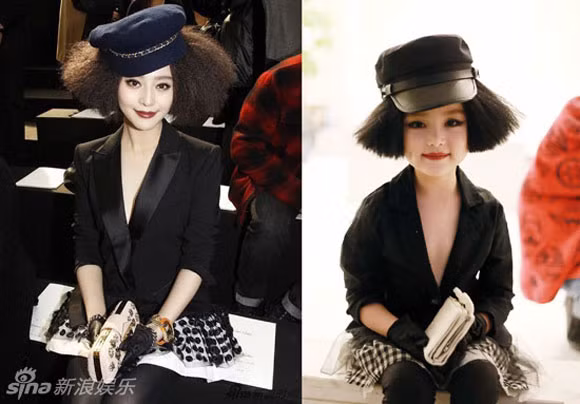 Vest đen kết hợp cùng chân váy kẻ sang trọng, bản sao nhí của Phạm Băng Băng cũng khiến nhiều người phát cuồng vì lúm đồng tiền cực yêu.