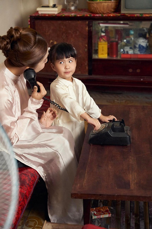 Bé Sol có nhiều biểu cảm đáng yêu khi chụp ảnh Tết.