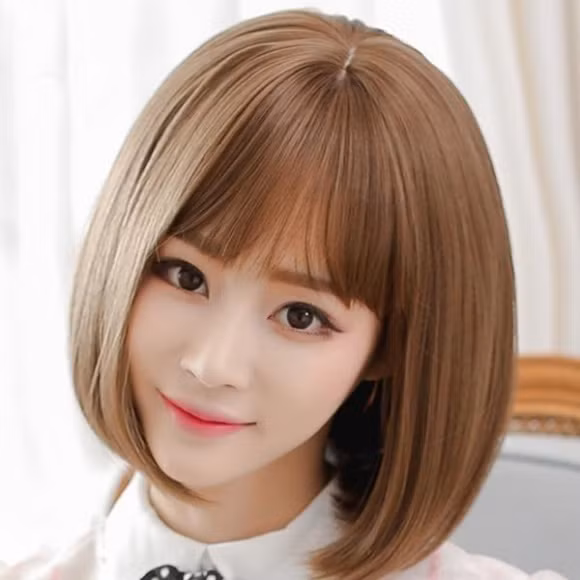 Tóc ngang vai duỗi cúp là kiểu ưa thích của những bạn gái ưa tông trang điểm nhẹ nhàng. Ảnh: Internet.