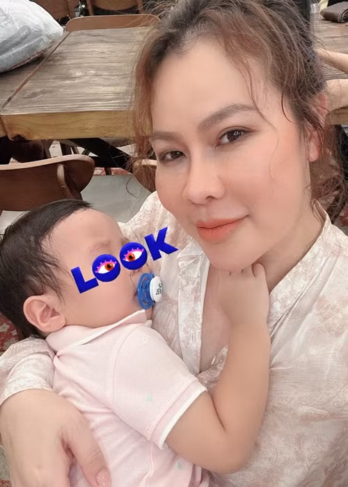 Vợ chồng Quý Bình từng giấu mặt con trai chung.